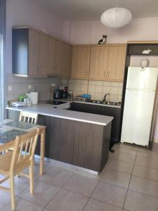 Kuchyňa alebo kuchynka v ubytovaní 180 Degree Sea View Apartment + 11 fotografií