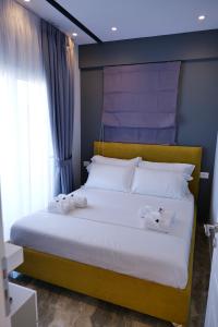 Postel nebo postele na pokoji v ubytování Blue Water Hotel Ksamil