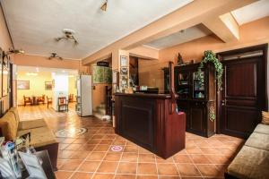 a room with a kitchen and a living room at Alsos House in Kalabaka