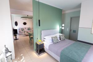 Postel nebo postele na pokoji v ubytování Magnolia - Apartment in Kalamata