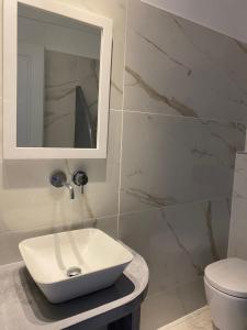 Baðherbergi á Hotel Hellas