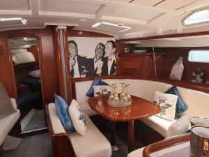a small table in the back of a boat at LUXURY YACHT STAY "White Dove" sleeps 6 in Gibraltar