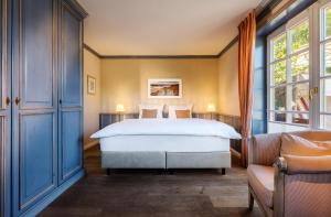Ein Bett oder Betten in einem Zimmer der Unterkunft Hotel Reethüüs