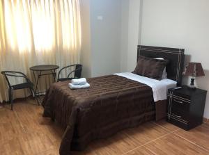 Кровать или кровати в номере B&B Cusing Wasi