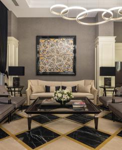 a living room with a couch and a table at Azzap Hotel Galata in Istanbul