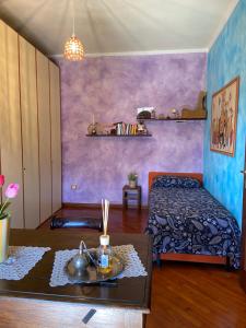 Posteľ alebo postele v izbe v ubytovaní Casa Rosaria