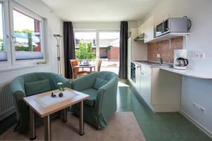 Kuchyň nebo kuchyňský kout v ubytování De Kanalkieker Apartmenthaus Meier