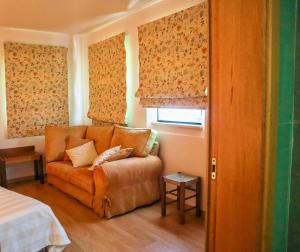 Cama ou camas em um quarto em Hotel Casa da Nora
