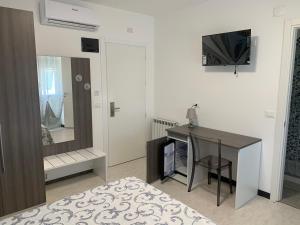 TV a/nebo společenská místnost v ubytování Hotel Aurora
