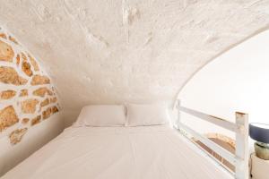 Postel nebo postele na pokoji v ubytování Casina La Cerasa