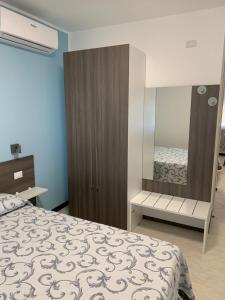 Postel nebo postele na pokoji v ubytování Hotel Aurora