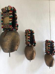 a group of ornaments hanging on a wall at Hirschen Wald in Wald