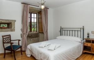 Posteľ alebo postele v izbe v ubytovaní Casa Sar de Cespón