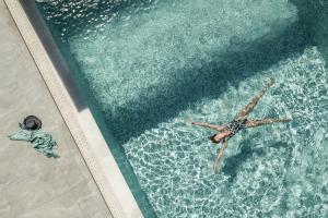 Bazén v ubytovaní Mossa Well Being Hotel alebo v jeho blízkosti