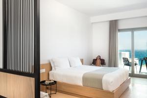Cama ou camas em um quarto em Mykonos Soul Luxury Suites