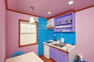 Dapur atau dapur kecil di CHAEUL Pension