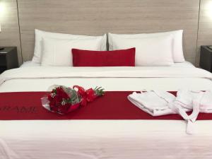Postel nebo postele na pokoji v ubytování Arame Hotel
