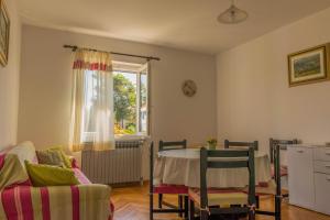 Posezení v ubytování Apartments White & Green in Malinska