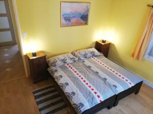 Letto o letti in una camera di Cà di Noni