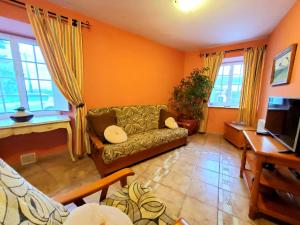 Телевизор и/или развлекательный центр в Apartamentos Turísticos Rosa
