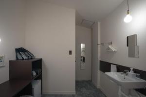 Koupelna v ubytování Hotel Trim