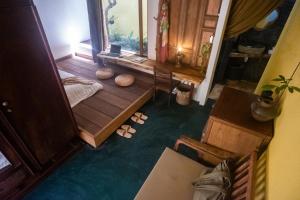 an overhead view of a room with a bedroom at Leranda Homestay in Hue