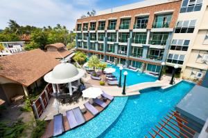 an aerial view of a hotel with a swimming pool at Ramaburin Resort Patong - Walking distance to the Beach in Patong Beach