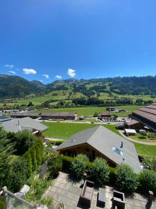 an overhead view of a building with a patio at Pegasus in Zweisimmen