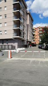 an empty parking lot in front of a building at Anja in Bijeljina