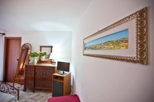 TV a/nebo společenská místnost v ubytování Hotel Moderno