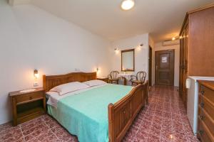 Postel nebo postele na pokoji v ubytování Adria Brela Apartments