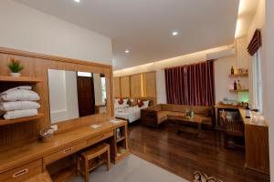 A seating area at UCT Taunggyi Hotel