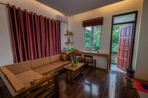 A seating area at UCT Taunggyi Hotel