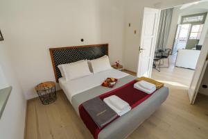 Livin Hydra Private Collection Suite 3 tesisinde bir odada yatak veya yataklar