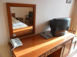 Postel nebo postele na pokoji v ubytování Várkert Panzió