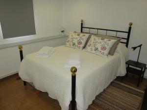 Uma cama ou camas num quarto em Casa Porta de Santiago