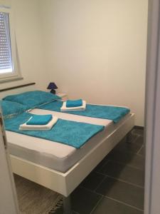 Ein Bett oder Betten in einem Zimmer der Unterkunft Apartment Matic