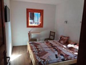 Postel nebo postele na pokoji v ubytování Guest House Vukicevic