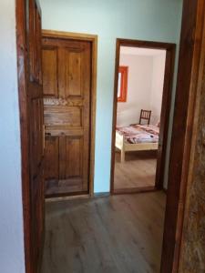Postel nebo postele na pokoji v ubytování Guest House Vukicevic