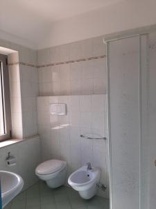 Koupelna v ubytování Hotel Pegaso