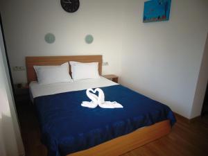 Postel nebo postele na pokoji v ubytování Casa Albatros