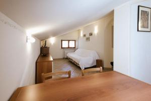 Llit o llits en una habitació de Casa GINESTRA a Bagno Vignoni