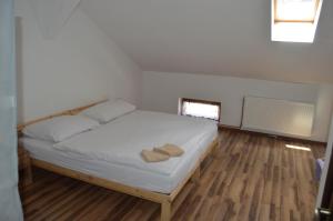 Postel nebo postele na pokoji v ubytování Penzion Rafaella