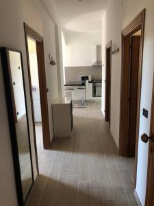 a hallway of a kitchen with a counter top at Casa SamAsia in Varazze