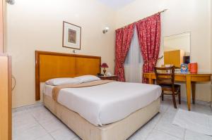Postel nebo postele na pokoji v ubytování Royalton Hotel + 22 fotografií