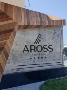 Certificato, attestato, insegna o altro documento esposto da Hotel Aross