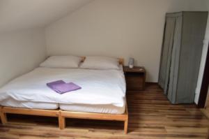 Postel nebo postele na pokoji v ubytování Penzion Rafaella