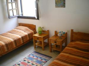 Postel nebo postele na pokoji v ubytování Bayview Apartments