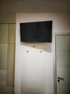 TV a/nebo společenská místnost v ubytování Centar + 12 fotografií