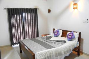 Postel nebo postele na pokoji v ubytování Hotel H2O